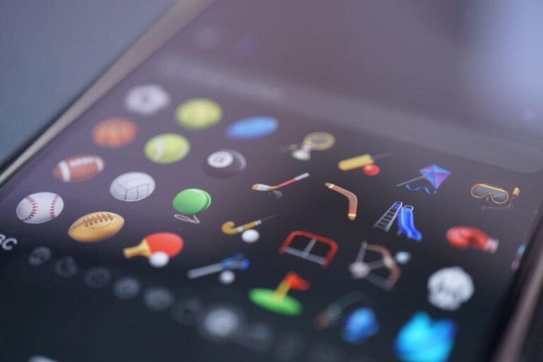 A detailed view of various sports-themed emojis displayed on a smartphone screen.